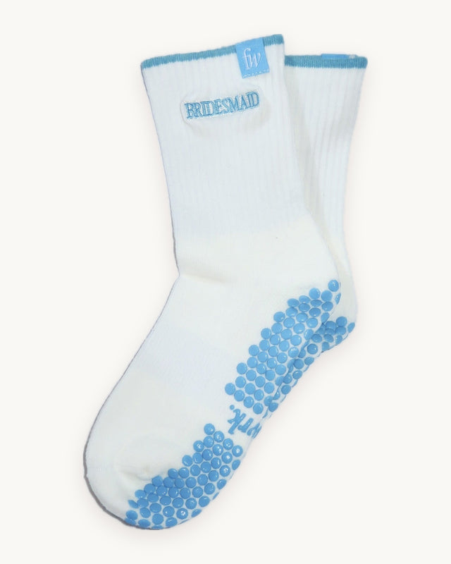 Bridesmaid grip socks in cream with blue silicone grip, flat lay