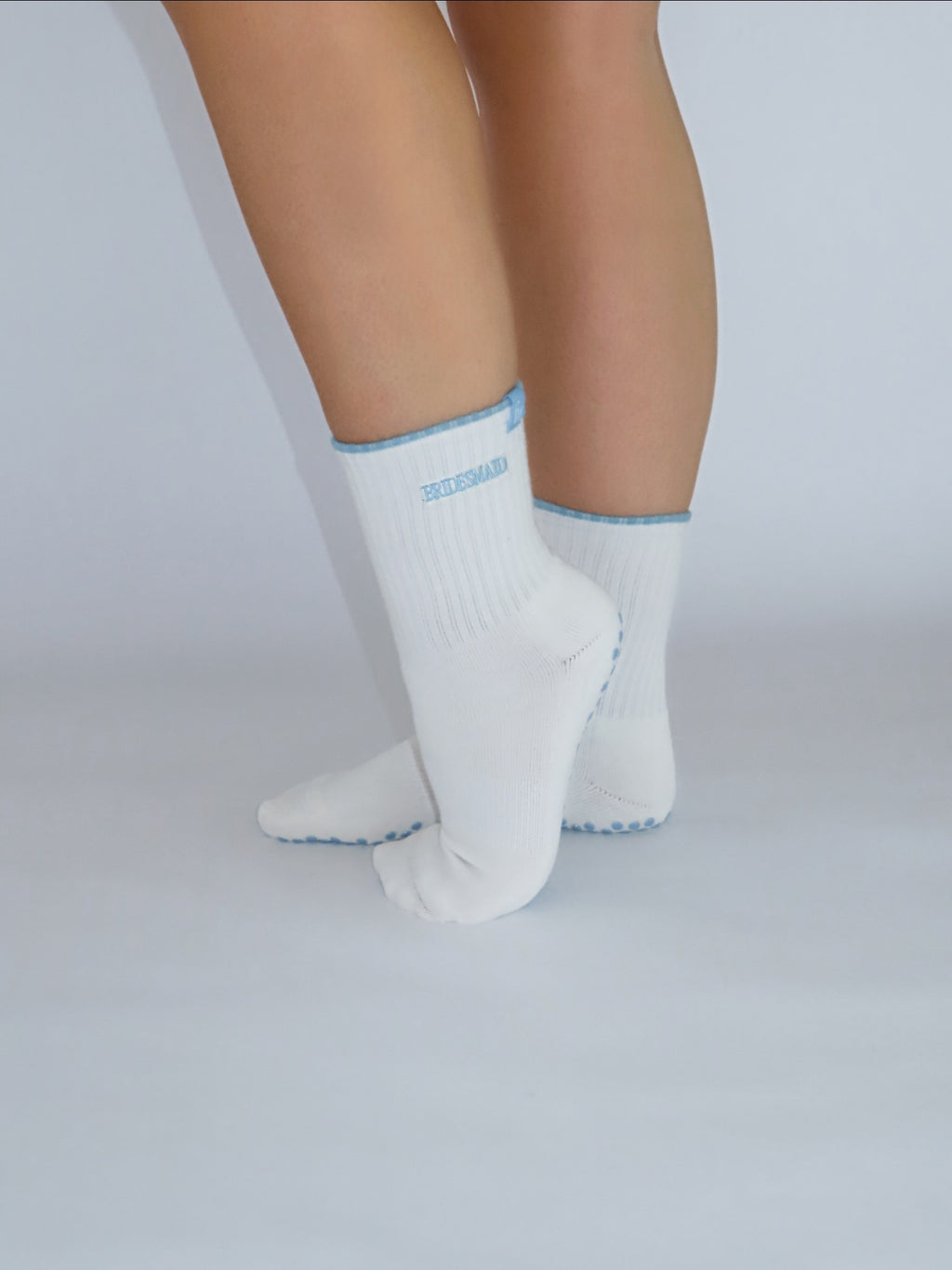 Bridesmaid grip socks worn on feet