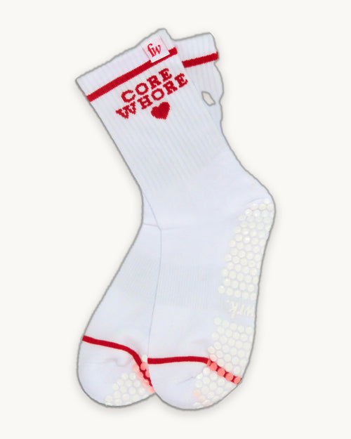 Core Wh*re grip socks, flat lay