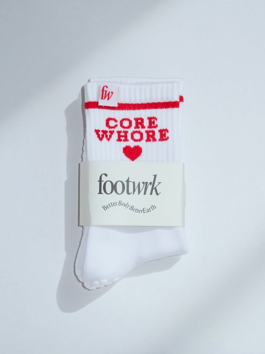 Core Wh*re grip socks in Footwrk packaging
