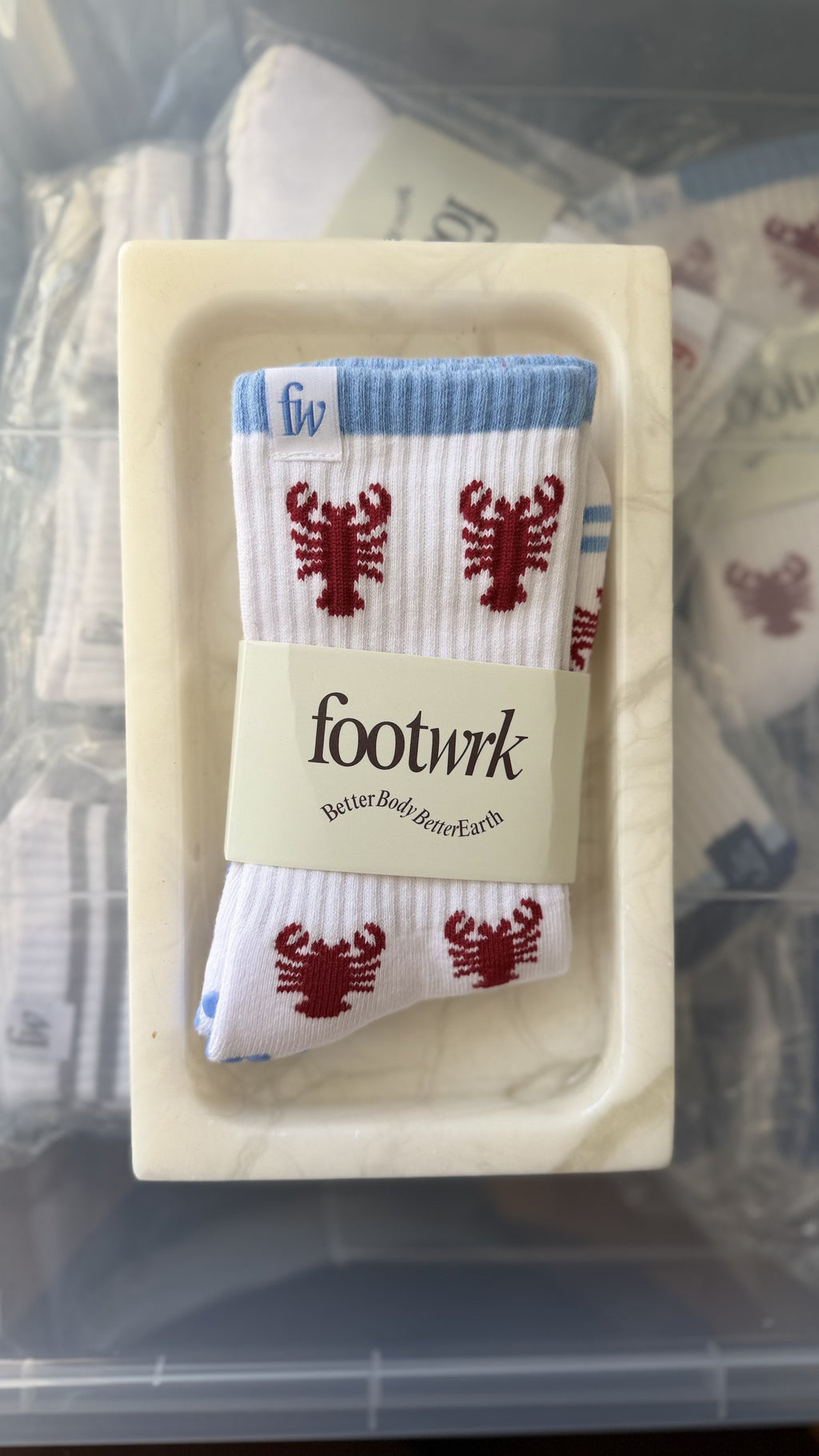Lobster Roll grip socks in Footwrk packaging
