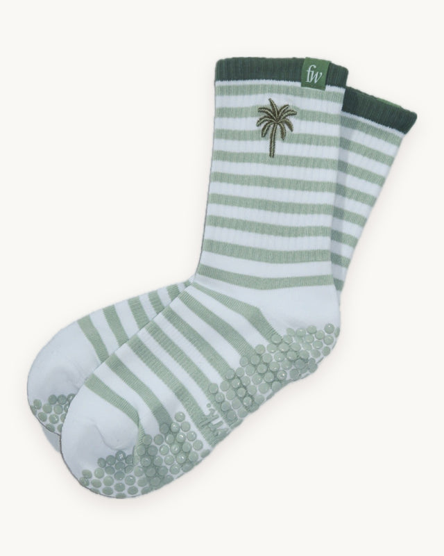 Palm Trees grip socks in green stripe with palm motif, flat lay