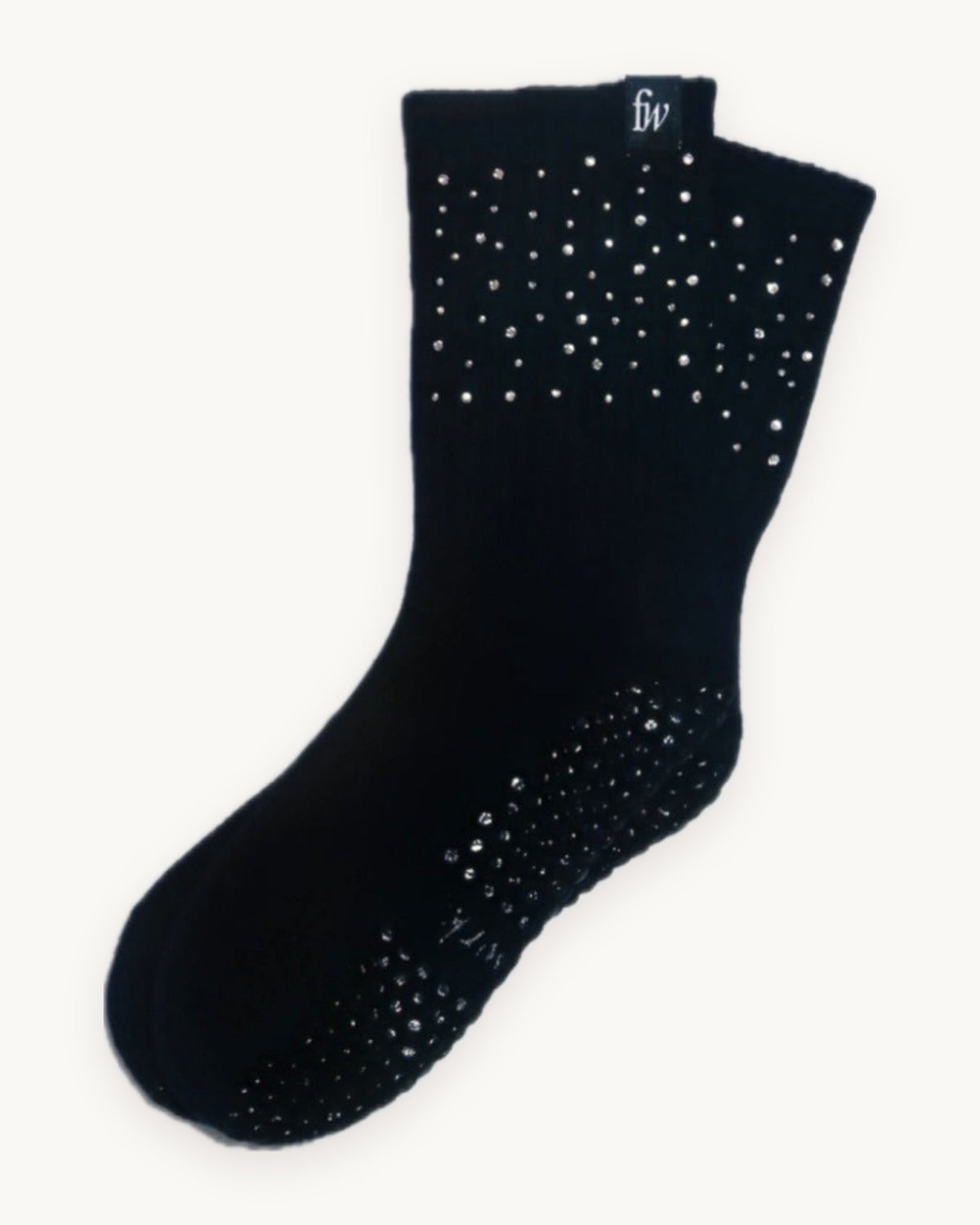Rhinestone grip socks in black with crystal detail, flat lay